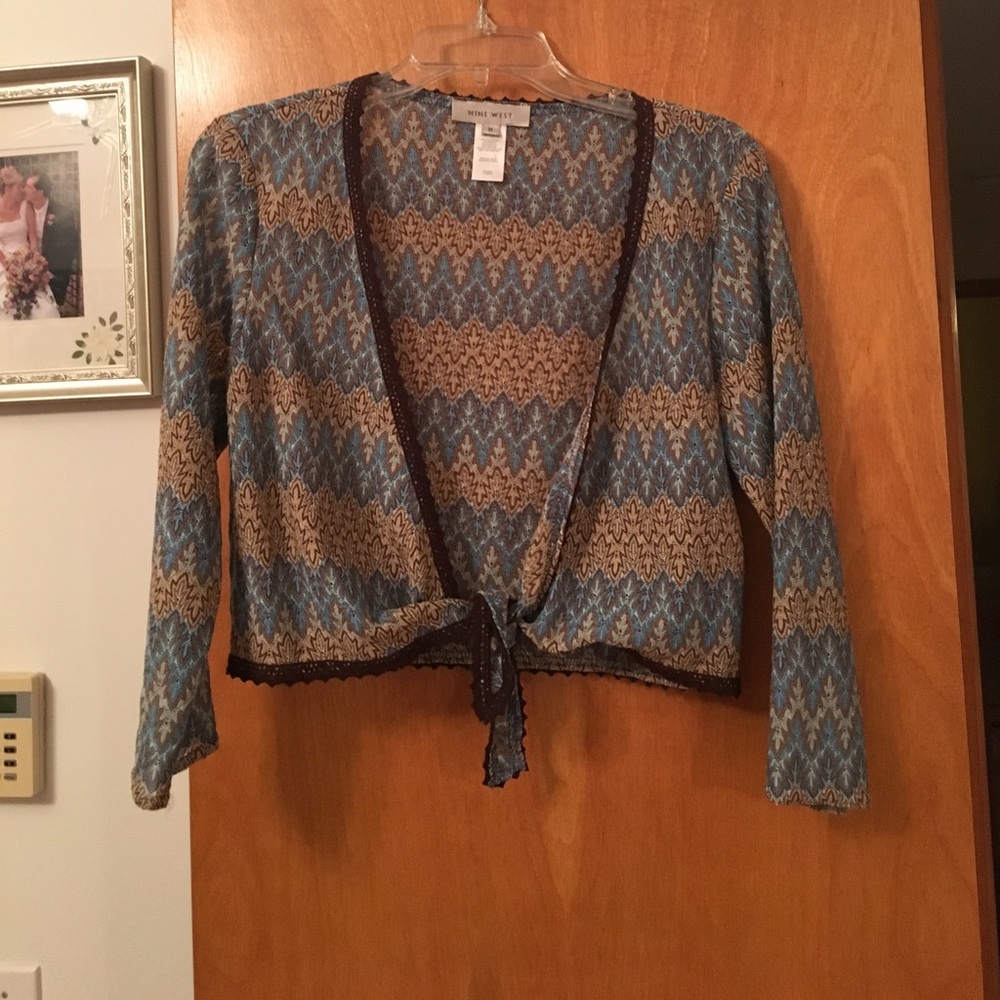 Light weight sweater great with a tank