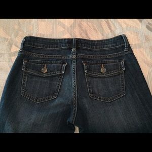 Button flap pocket petite size jeans