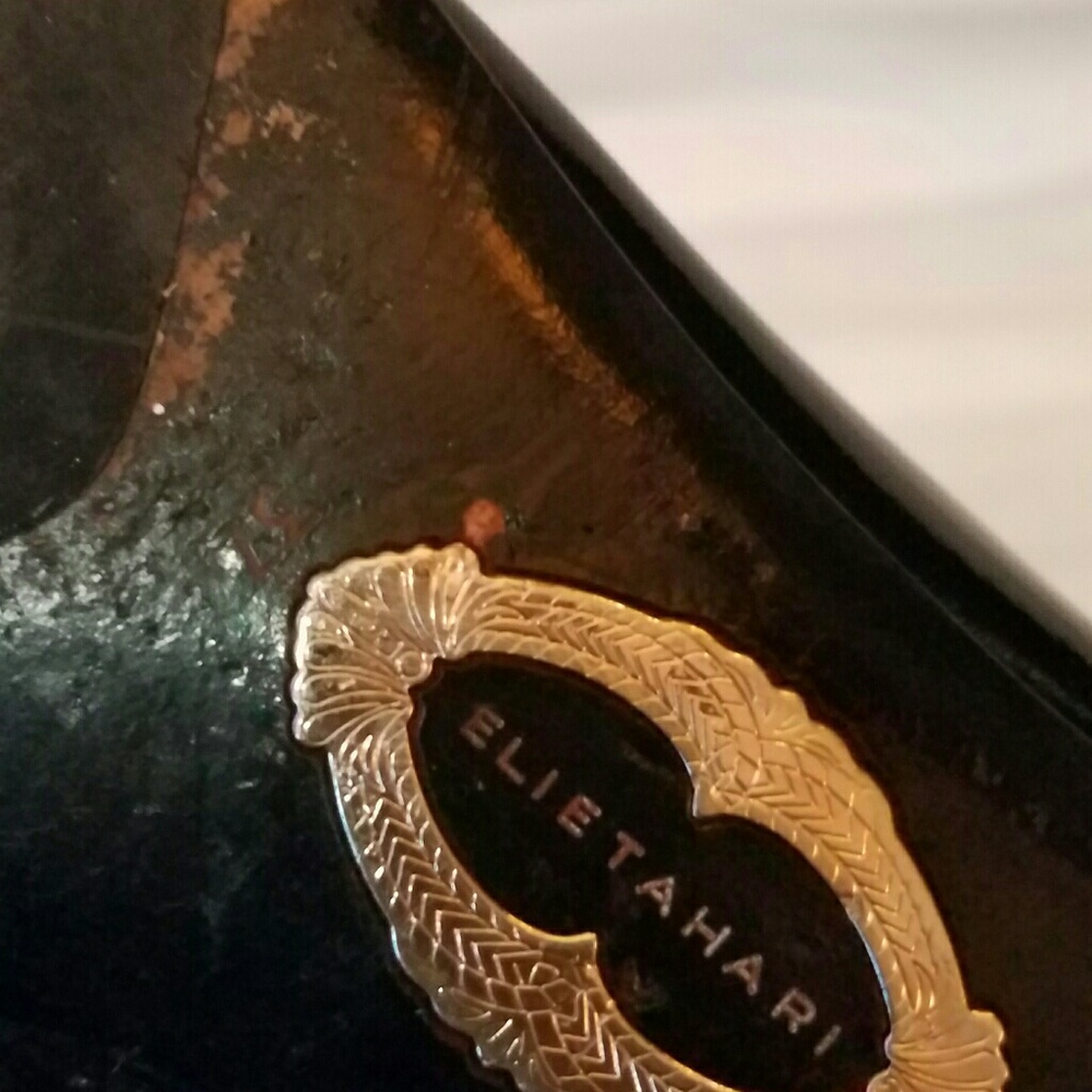 Black patient leather boots