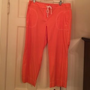 Orange sherbet cotton/poly cropped pants.