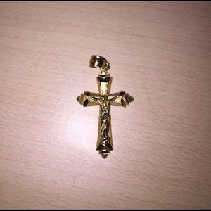 Gold cross pendant