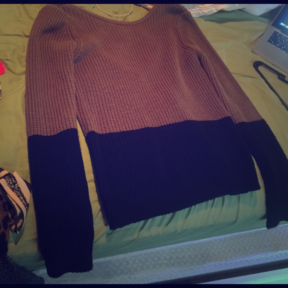 Beige and black sweater with low cut back!