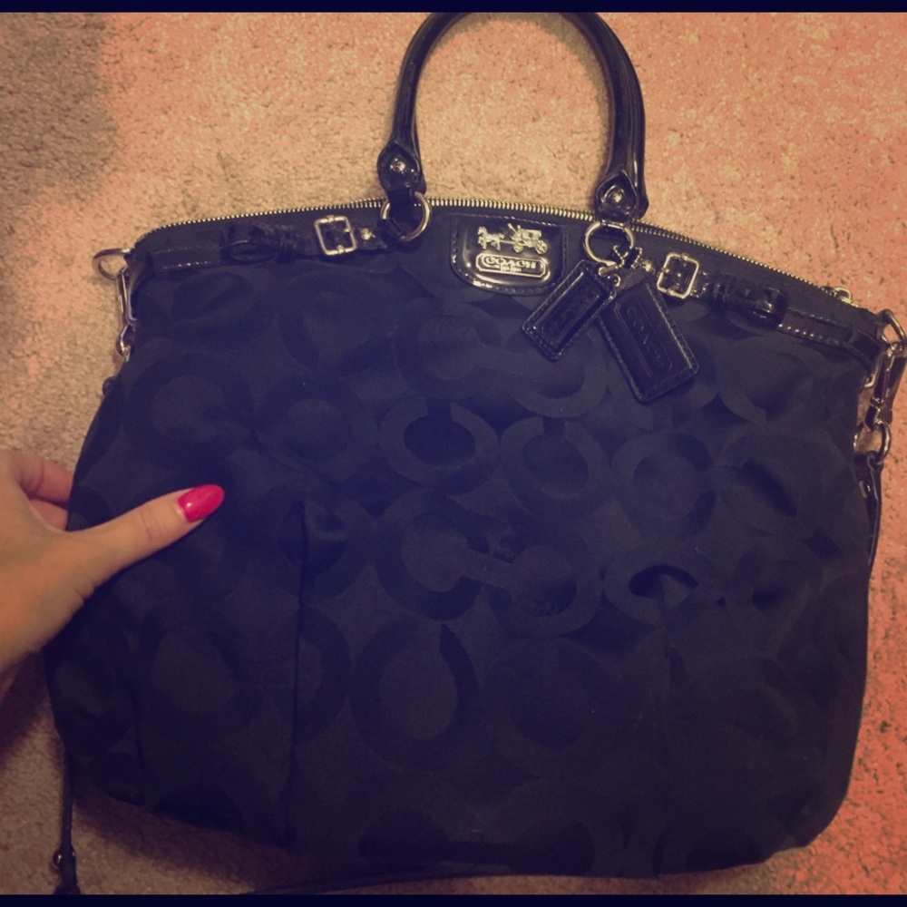Black Coach shoulder bag .