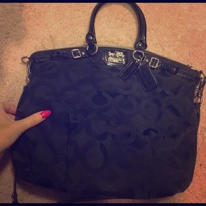 Black Coach shoulder bag .