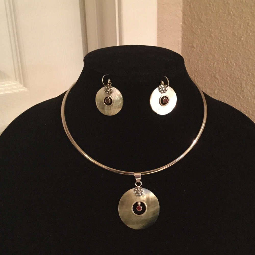 Sterling silver necklace and earrings set.