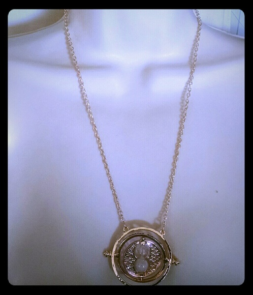 Beautiful goldtone hourglass unique necklace