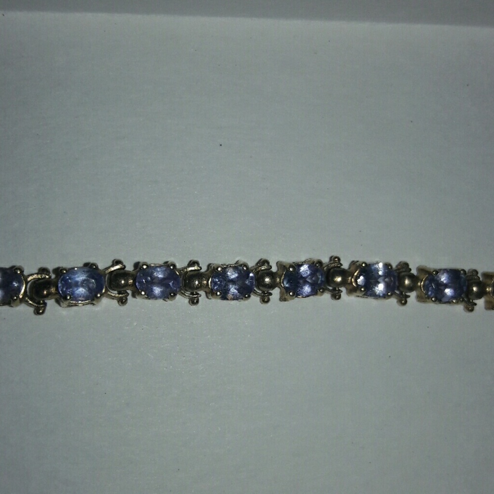 14k solid gold oval tanzanite tennis bracelet EUC
