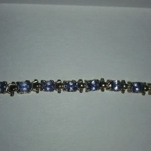 14k solid gold oval tanzanite tennis bracelet EUC