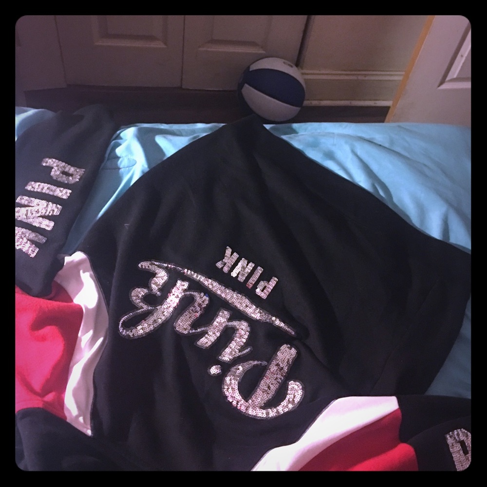 Red black & white pink hoodie .