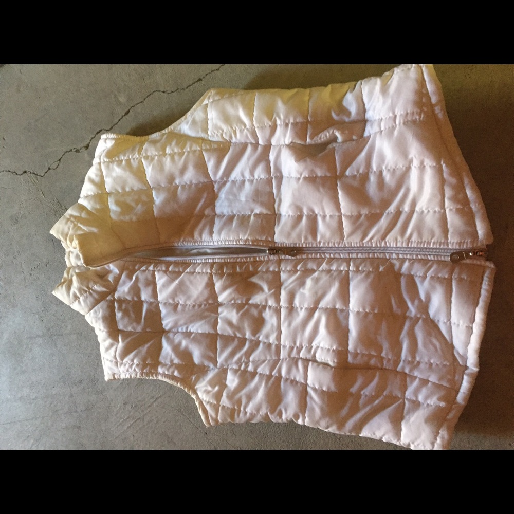 White puffy vest
