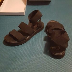 Cheap Monday black platform sandals.