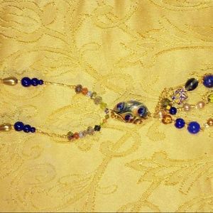 Beautiful peacock charm necklace