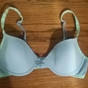 IZOD robin egg blue bra with green trim and a bow