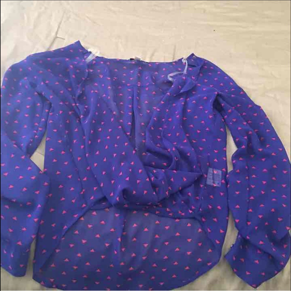 Blue blouse with small Red triangles