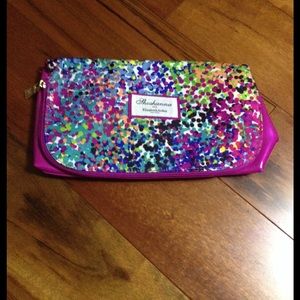 Hot pink Elizabeth Arden makeup pouch. Obo