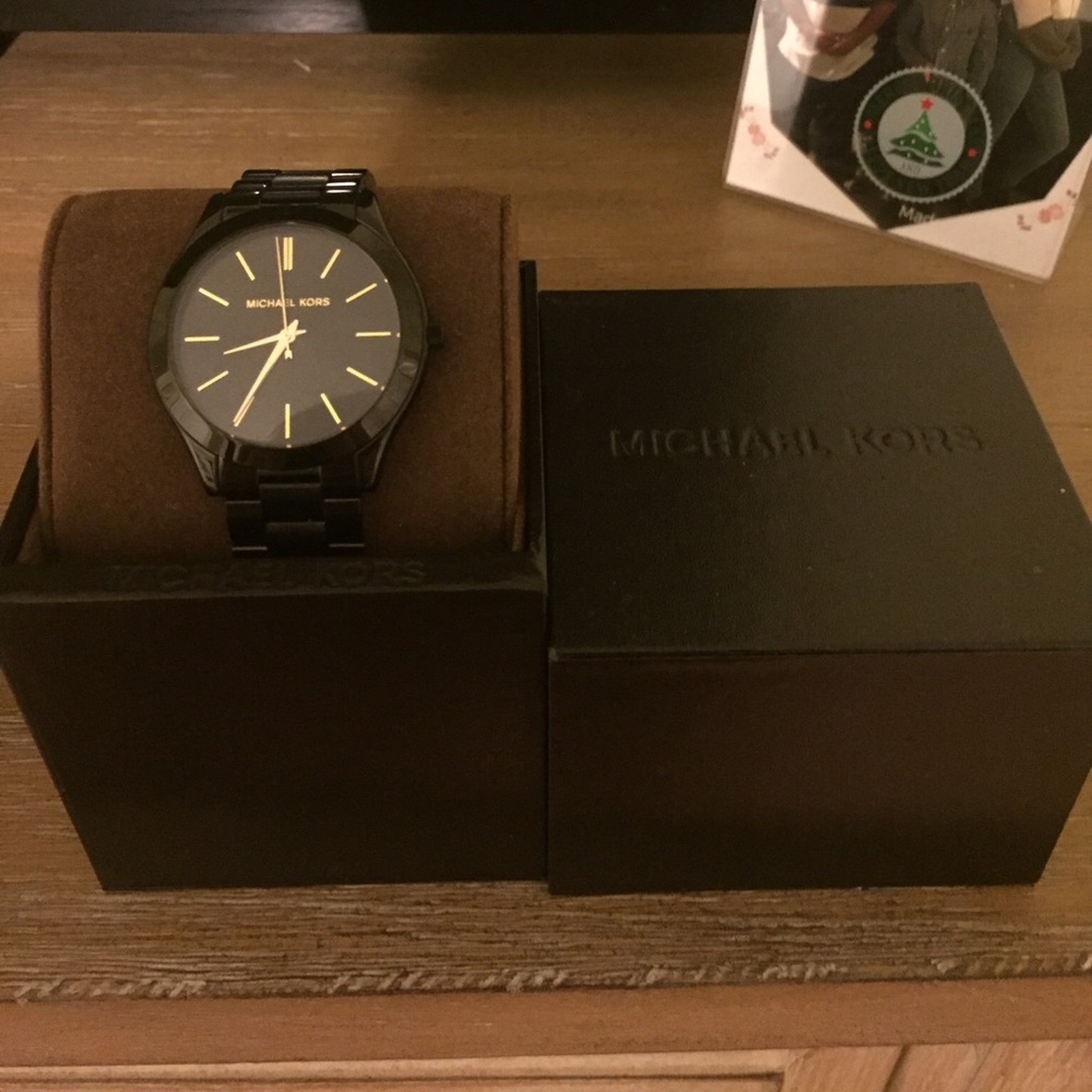 Black and gold Michael Kors watch