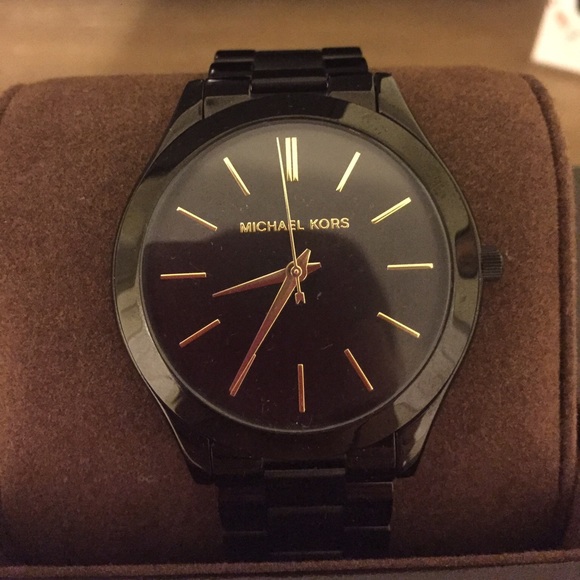 Black and gold Michael Kors watch