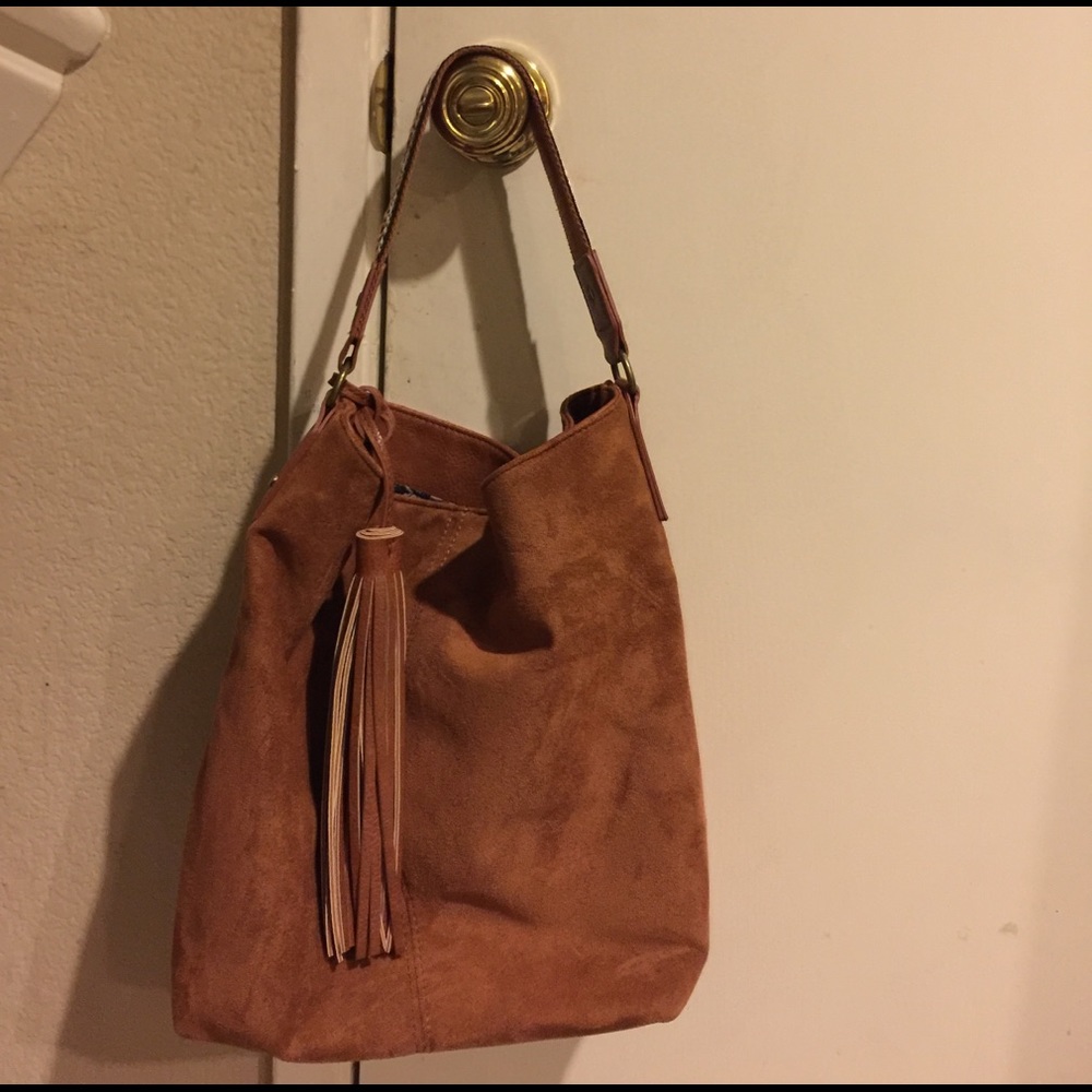 BKWOT Carlos Santana micro suede bucket purse