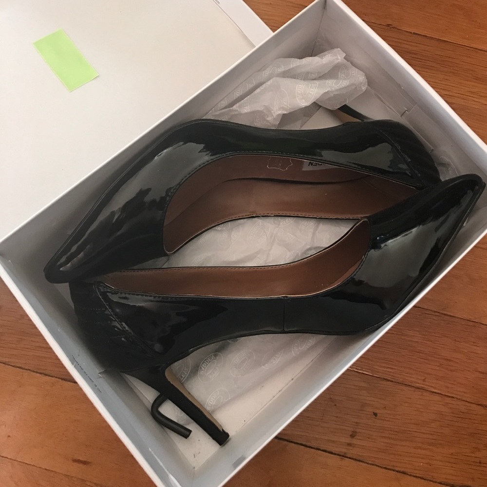 Black patent pumps never worn