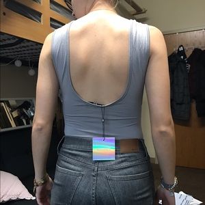 Grey body suit