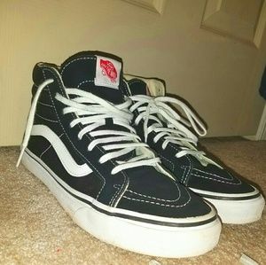 White and Black hightop vans