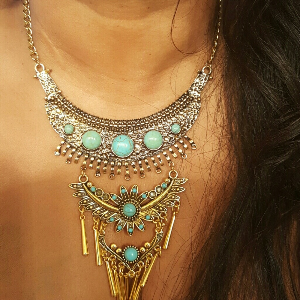 Gold tone turquoise tribal necklace