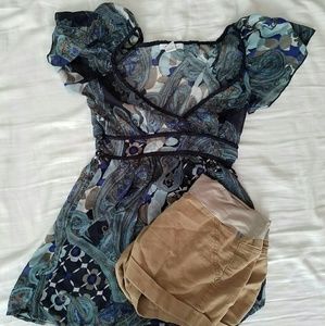 Maternity outfit. Blouse and shorts.