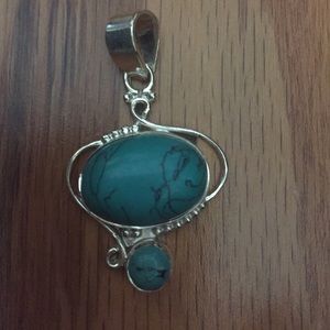 Turquoise and silver pendant