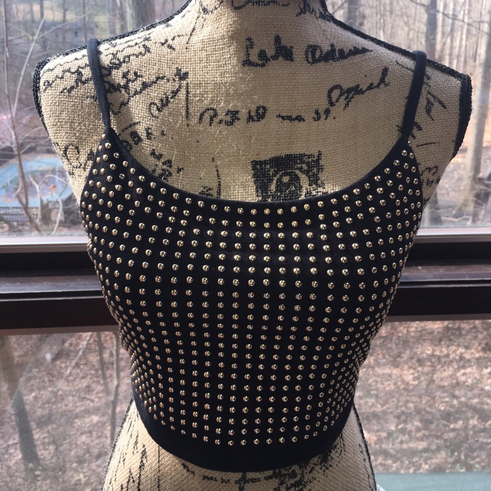 Gold studded crop top.