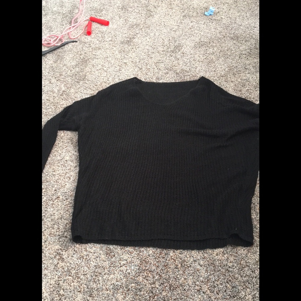 Black knit sweater.  Tunic like
