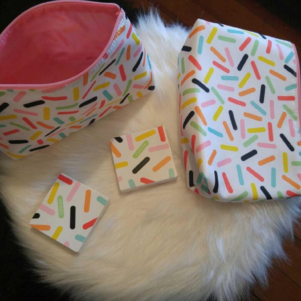 Clinque Shadow and makeup bags