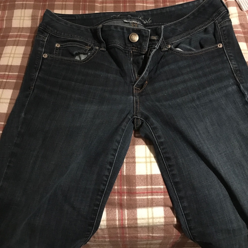 AE boots cut skinny jeans