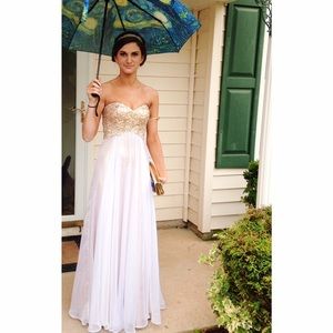 A white and gold prom dress