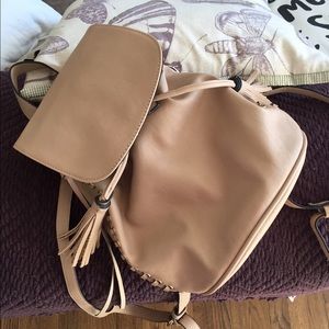 Faux leather bucket bag backpack