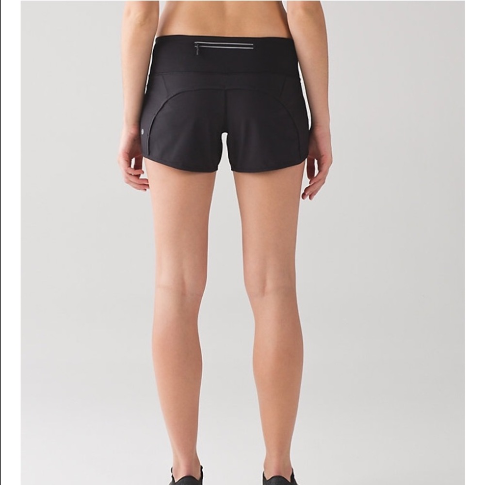 black Lululemon shorts with zipper in the back