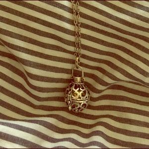 Ball and cage necklace