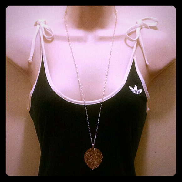 Beautiful leaf long bright gold tone necklace