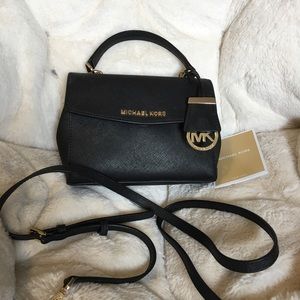 Michael kors small black purse.