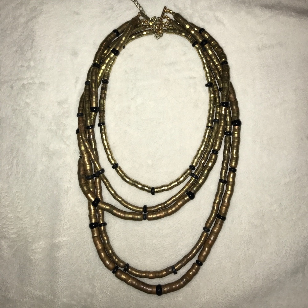 Gold and black slinky necklace