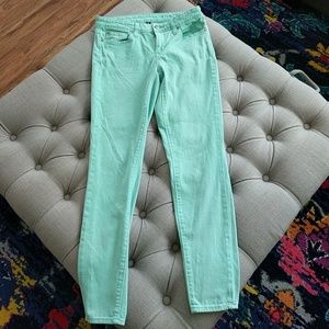 Mint green Gap super skinny premium jeans.