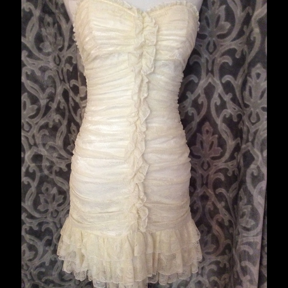 Never worn new no tags sweet cream lace Bebe dress