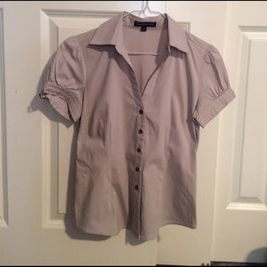 Express  tan shirt.