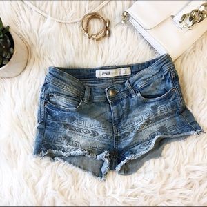 Denim shorts with a pattern