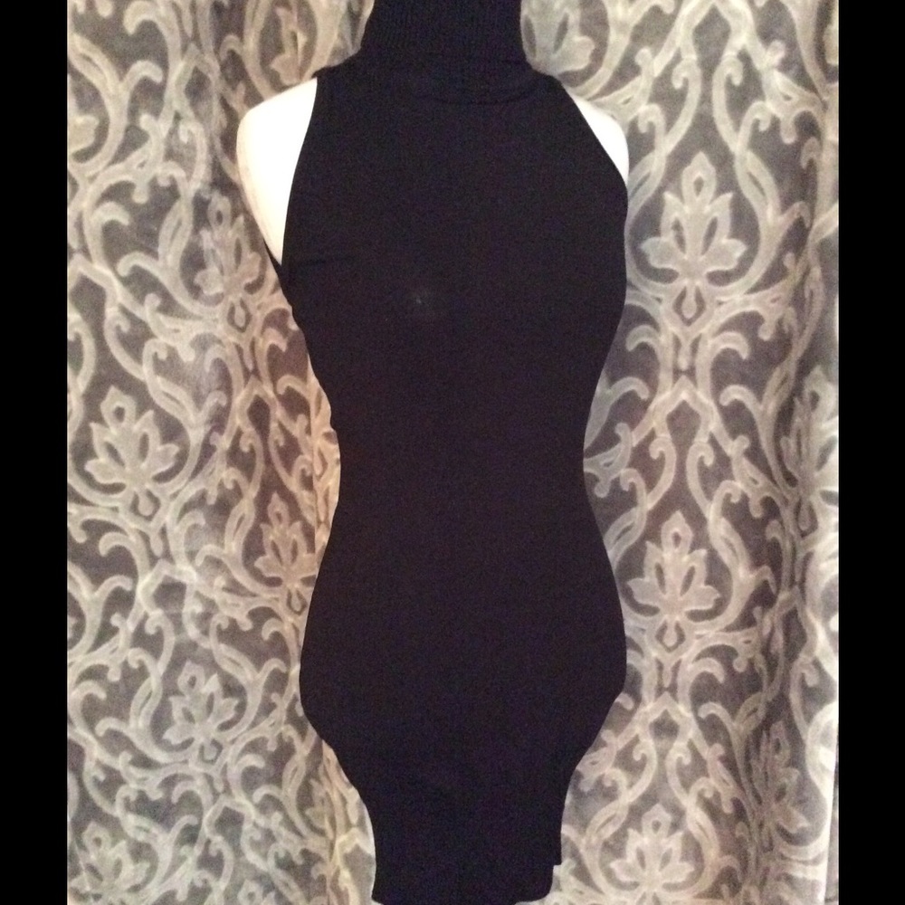 Worn 1x. Black sleeveless turtleneck Bebe dress