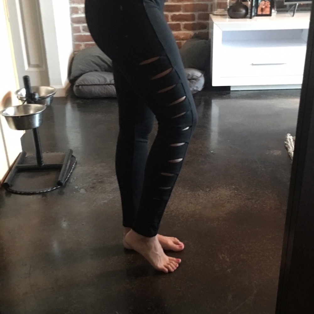 Bebe black leggings size medium. Cut out sides