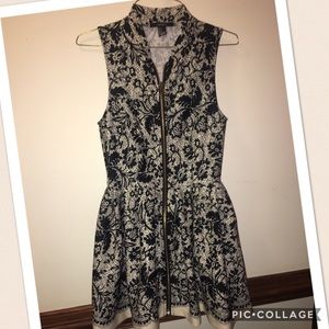 black and white dress with gold zipper