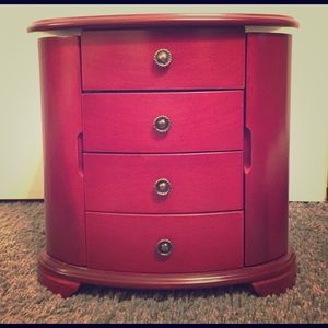 Beautiful wooden jewelry box. Plays music!