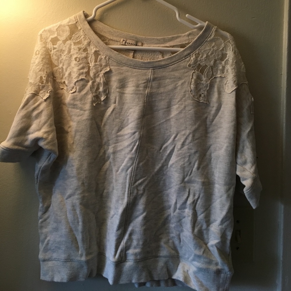 Cream colored sweatshirt with lace detail