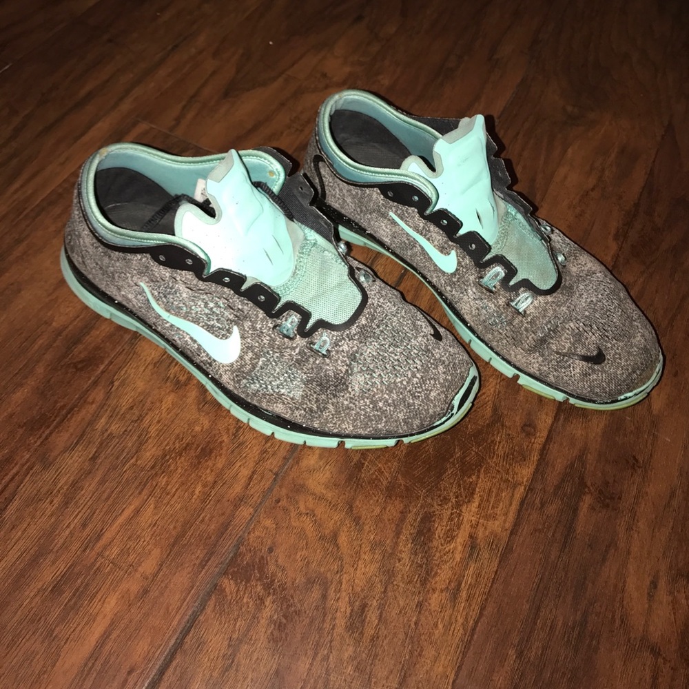 Mint blue and black Nikes
