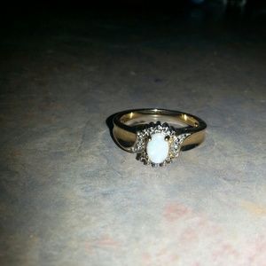 Ladies diamond & opal ring